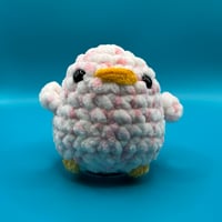 Image 1 of Fluffy Pink Duck Crochet Plush