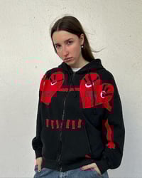 Image 1 of Sudadera negra corazones