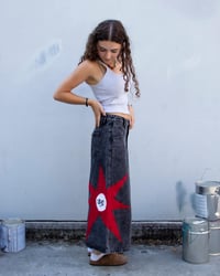 Vaqueros negros estrella