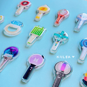 Image of boy group lightstick acrylic pins