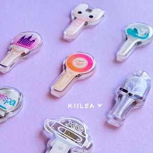 Image of girl group lightstick acrylic pins