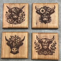 Image 1 of Hardwood Coaster Set Highland Cow