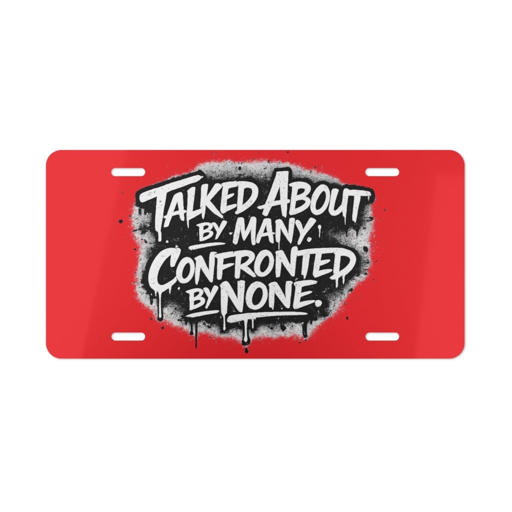 Image of Vanity Plate - 'Talked About by Many, Confronted by None' Red License Plate