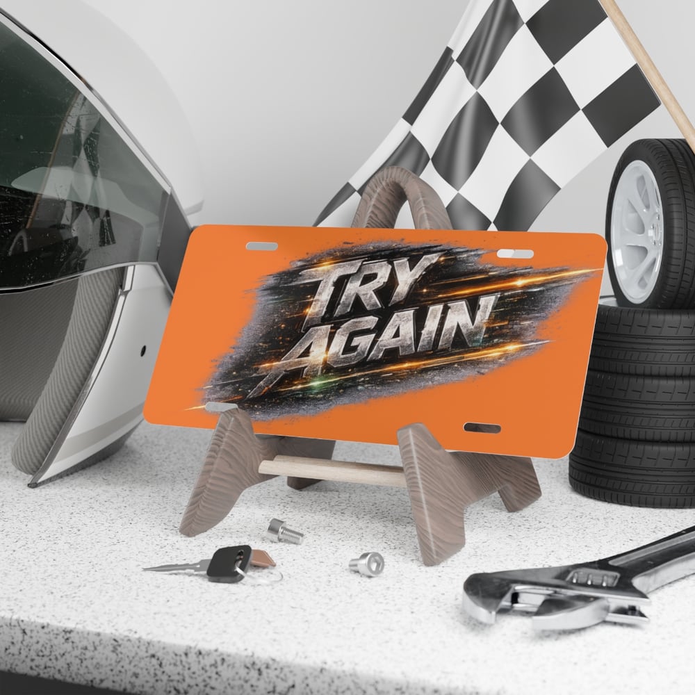 Image of Try Again Orange Vanity Plate — Motivational Decorative License Plate