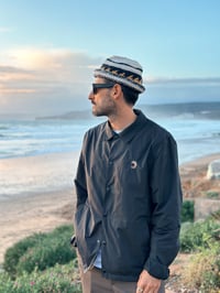 Image 1 of "Coach Jacket" negra 