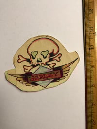 Image 1 of 1970’s Spaulding & Roger’s Harley Davidson Skull hand colored original production pork chop