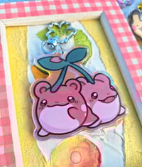 Image 1 of Cherry Spheal Holographic Acrylic Keychain