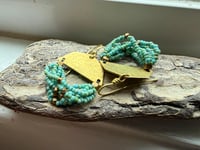Image 1 of Beaded brass earrings in blue  . n7