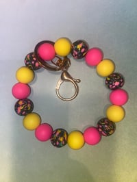 Pink and yellow wristlet keychain