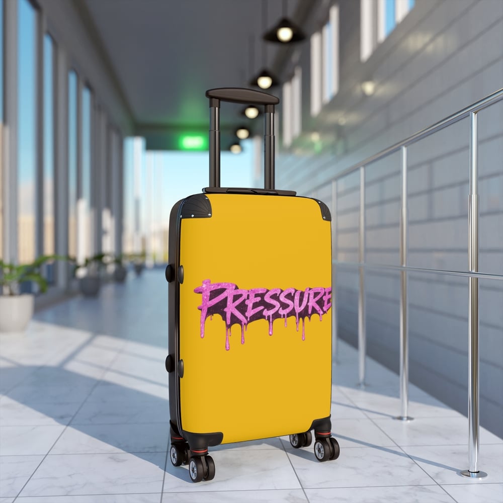 Image of Pressure Graffiti Suitcase — Yellow Carry-On Luggage with Pink Drip Street-Art Text