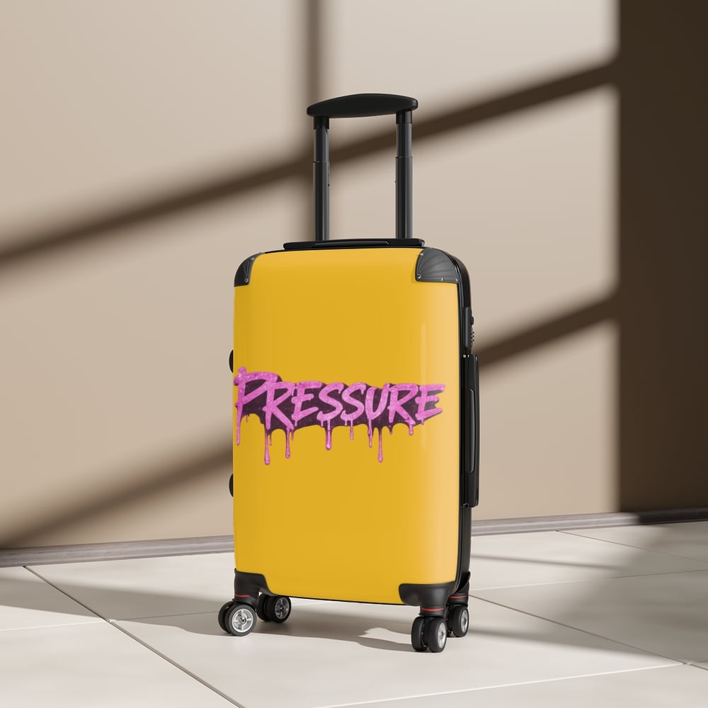 Image of Pressure Graffiti Suitcase — Yellow Carry-On Luggage with Pink Drip Street-Art Text