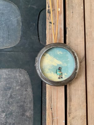 Image of pocket watch diorama - head in the clouds