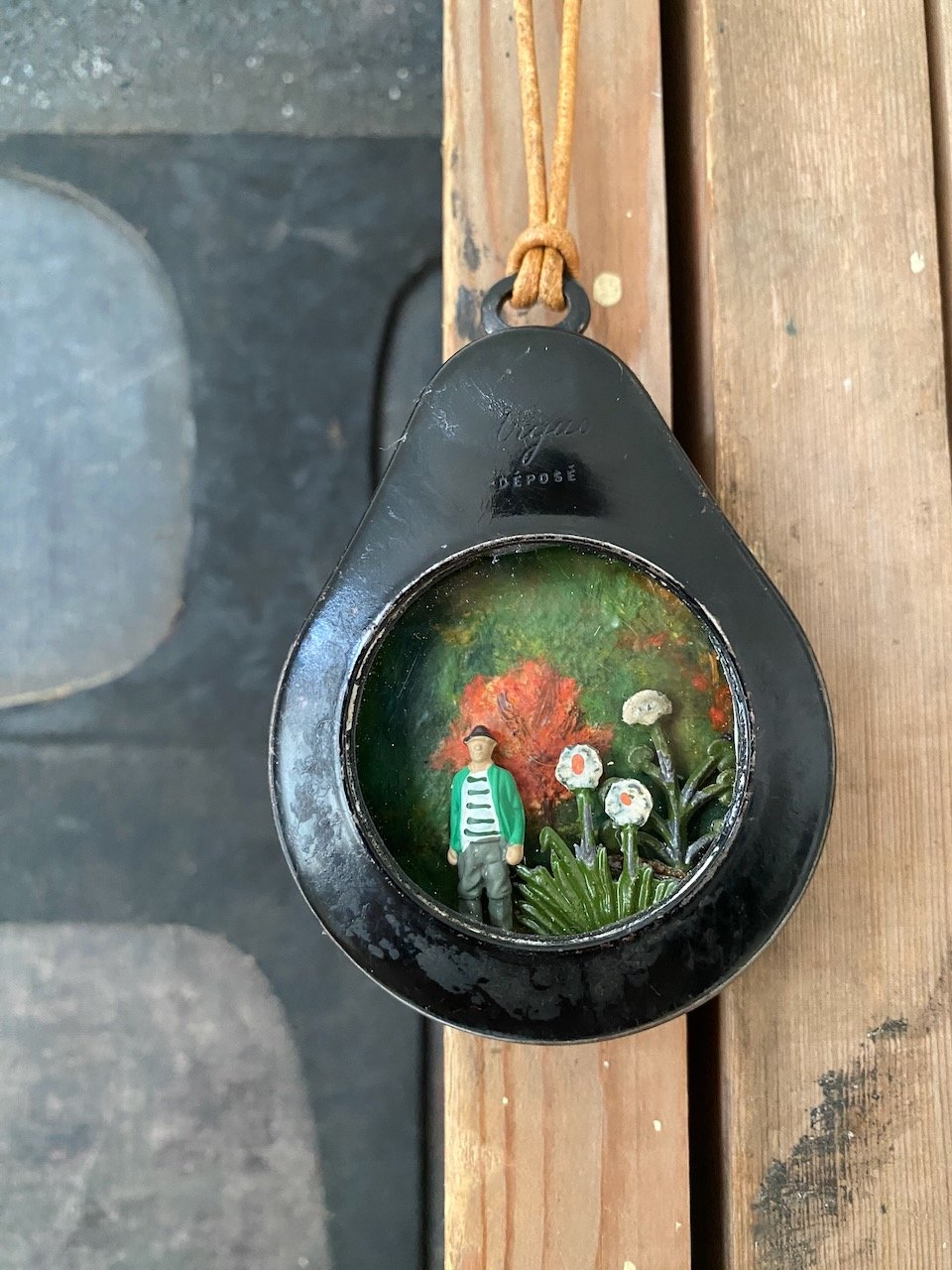 Image of pocket watch diorama -in the garden