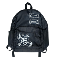 Image 1 of black crossbones patch backpack