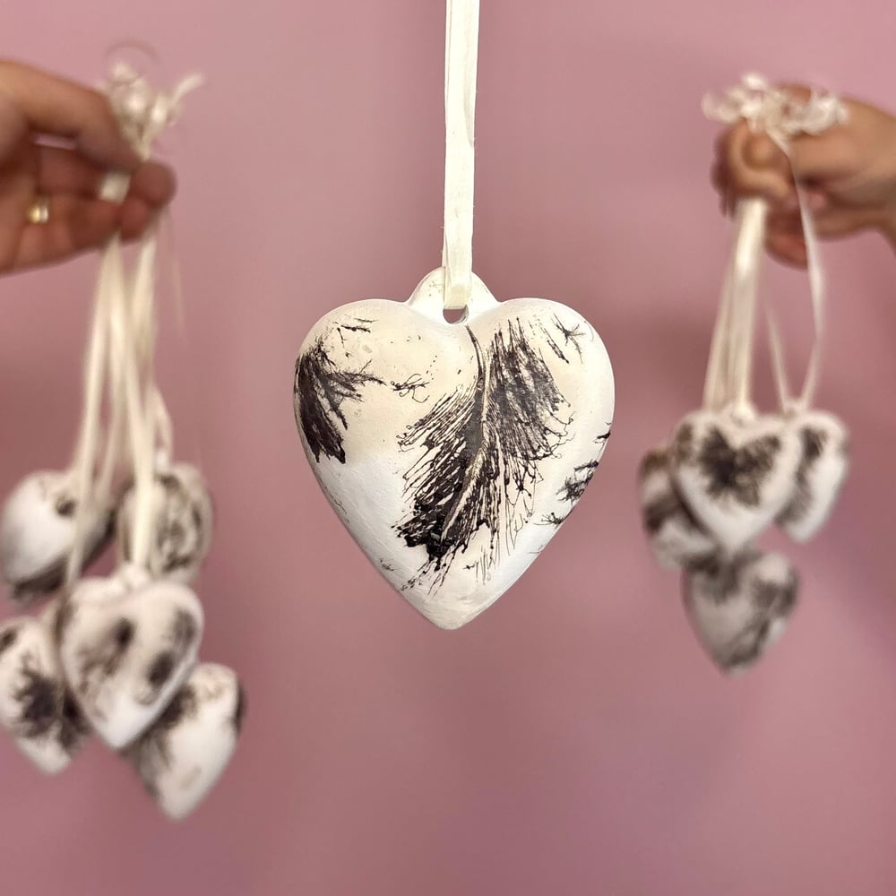 Image of Raku heart, random selection 