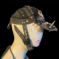 Image 1 of Ratty apocalypse patched spiked strapped moto crust hat