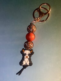 Cute shaggy cow keychain