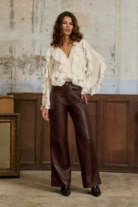 Image 1 of Blusa Bolta Crudo 