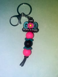 “With God all things are possible” pink keychain