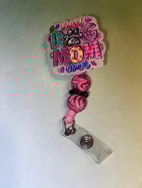 “Dog Mom” badge reel 