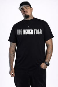 Image 1 of "WE NEVER FOLD" TEE