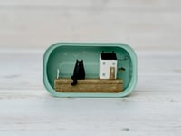 Image 1 of Cat house made from a sardine tin.