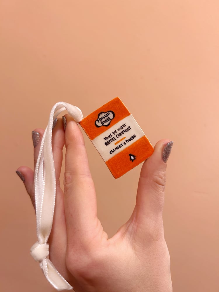 Image of ceramic book ornaments