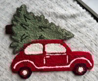 Old Car with Christmas Tree