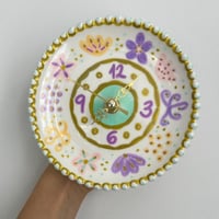 Image 1 of 5.5" Hand-Painted Lavender & Gold Ceramic Clock – Silent Whimsical Decor with Stand