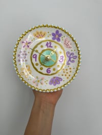 Image 2 of 5.5" Hand-Painted Lavender & Gold Ceramic Clock – Silent Whimsical Decor with Stand