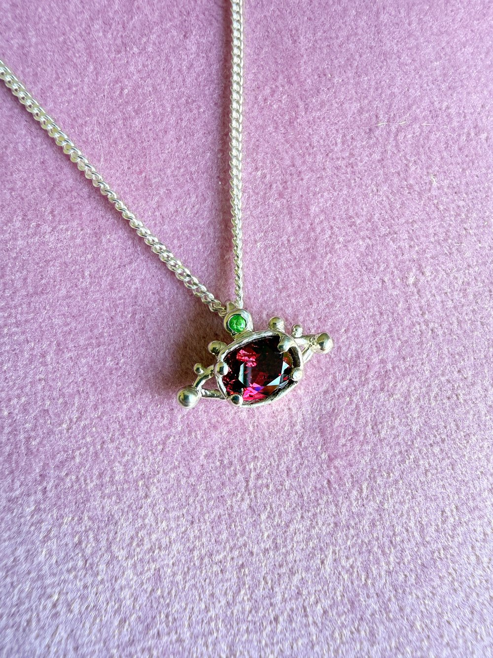 Image of Garnet Eye Pendant