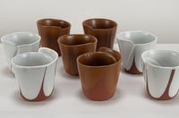 Image 4 of rust and white