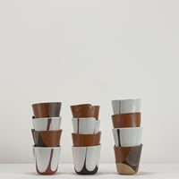 Image 3 of rust and white