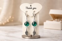 GREEN ROUND BEAD WITH SILVER LEAF DANGLE