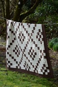 Image 1 of Poppy in Brown 