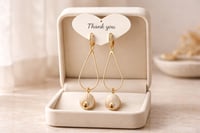 Image 6 of BROWN AND TURQUOISE STONES