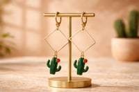 GREEN CACTUS WITH RED FLOWER