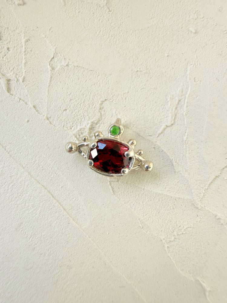 Image of Garnet Eye Pendant
