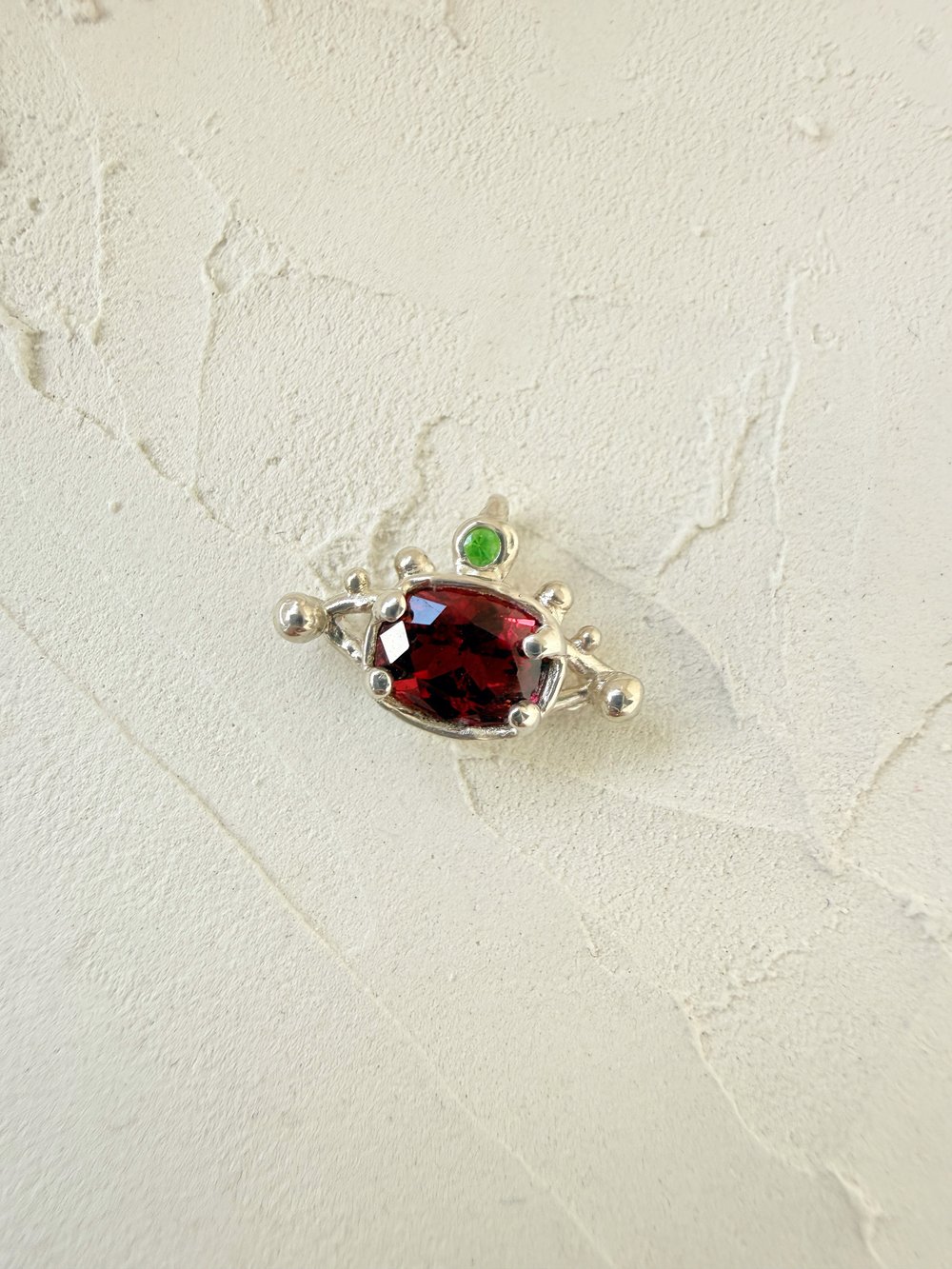 Image of Garnet Eye Pendant