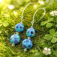 BLUE FLOWER BEADS WITH CLEAR BEAD SPACERS