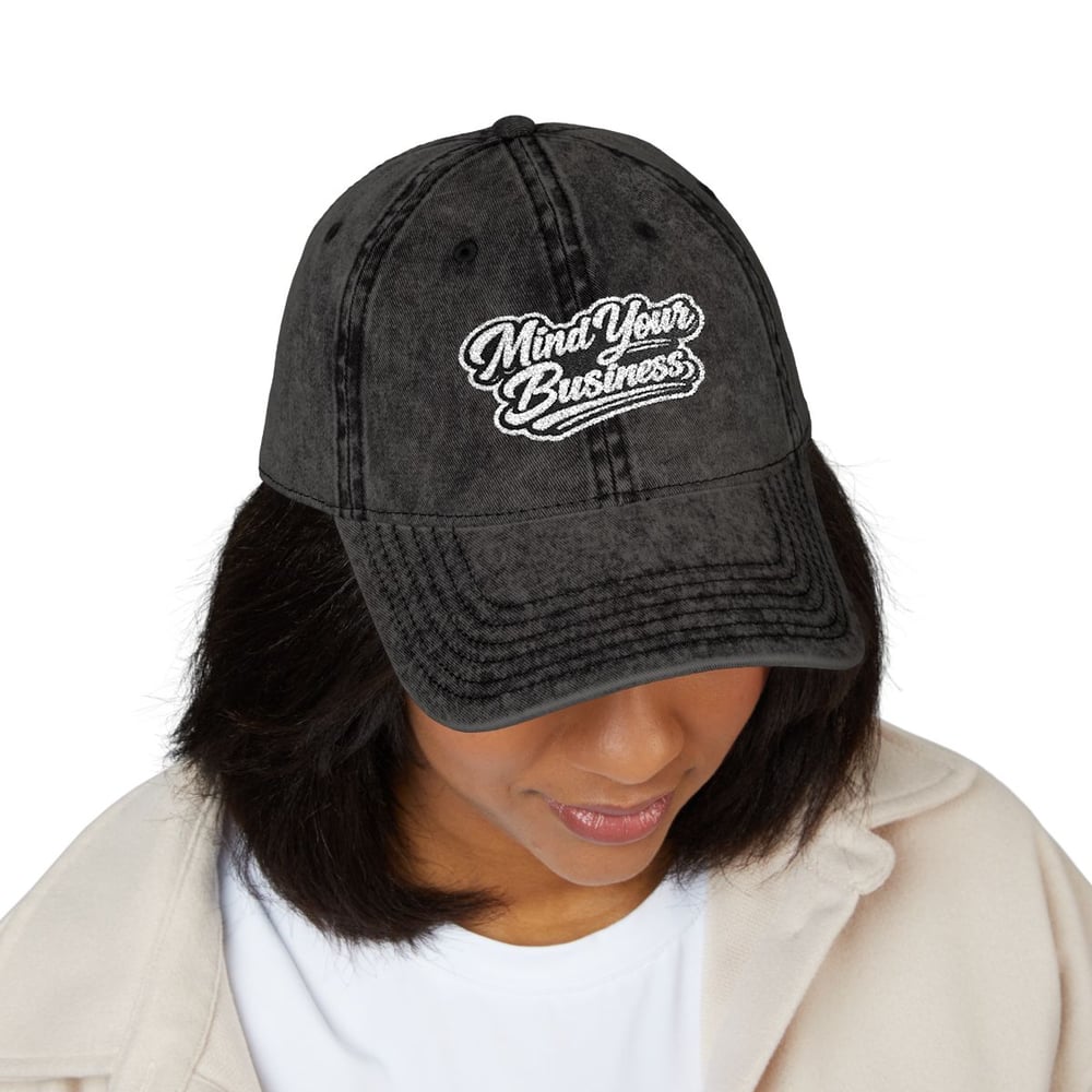 Image of Unisex Vintage Embroidered Baseball Cap - "Mind Your Business" Script Patch