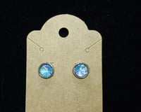 Image 1 of Blue Silver Starburst Pour Painted Stud Earrings