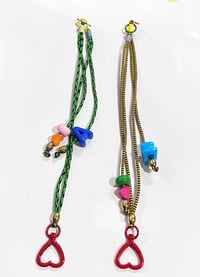 Image 1 of Portaamores y/o collar regulable rojo de Domingo Ayala 