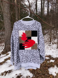 Image 4 of Quilt Block Sweatshirt: hand holding fire