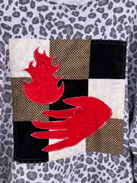 Image 2 of Quilt Block Sweatshirt: hand holding fire