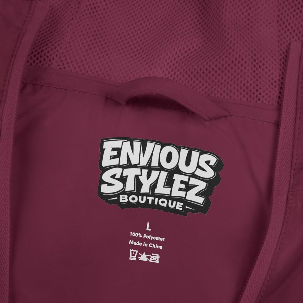 Image of Unisex Windbreaker Jacket — "Not Luck Not Random Chosen" Graphic Hooded Windbreaker