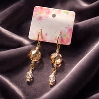 TOPAZ GOLD EARRINGS WITH CLEAR BEADS