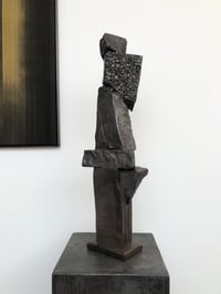 Image 1 of concrete and wood sculpture