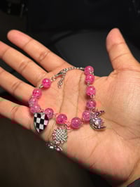 Pink charm beaded bracelet 