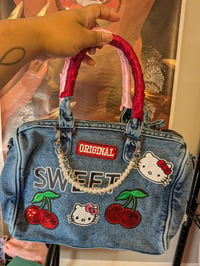 Image 2 of Hello kitty themed junk purse 